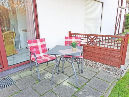 Erkély/terasz, Kleine Ferienwohnung mit Terrasse und Gartenblick in Gustow