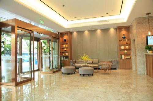 Home Inn Plus Shanghai Middle Ring Jinshajiang Road Fengzhuang Metro Station, Shanghai (foto 3)