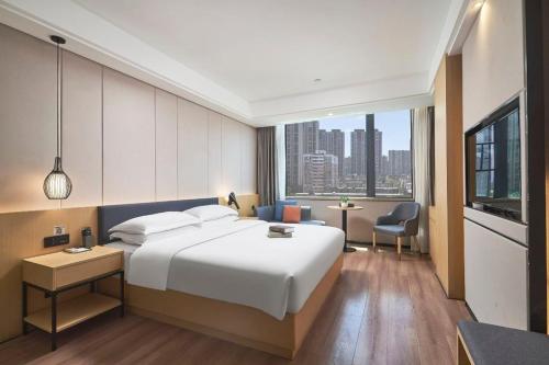 蔚徕酒店长沙贺龙体育馆黄土岭地铁站店 – Changsha, KY