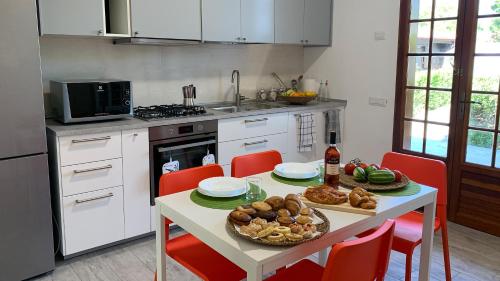 Kitchen, A Casa di Alfredo appartamento in villa in Masseria Grande