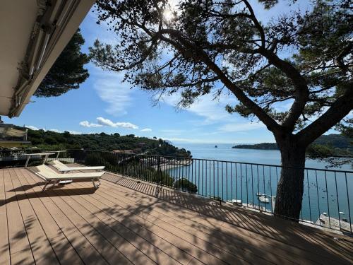 Exclusive designer apartment Facing Palmaria Island Spacious scenic terrace Bright Modern Interiors Fully equipped kitchen Air conditioning Private parking Up to 6 guests