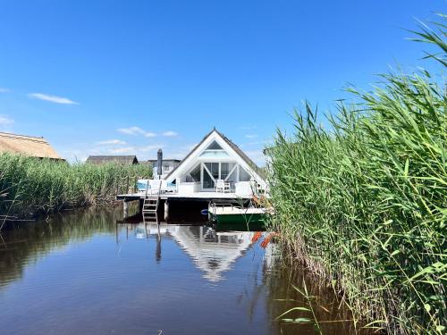 Seehütte Neusiedlersee "Strandhaus" inklusive Elektroboot in Rust, Österreich