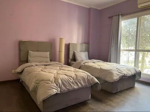 2BR Apartment with Private Garden in Downtown Rehab Near Malls - Tap to explore photos