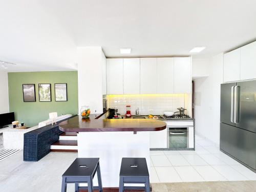 Cocina, Maruwá - Villa Lobo Guará - Paraíso na natureza (Maruwa - Villa Lobo Guara - Paraiso na natureza) in Catu De Abrantes