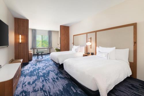 Queen Suite with 2 Queen Beds and Sofa Bed
