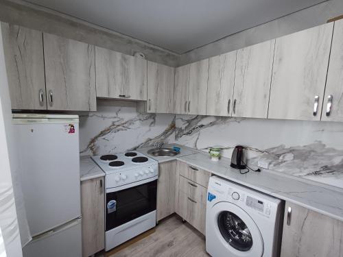 Квартиры гостиничного типа в Аксу