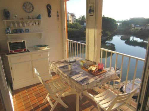 Saint Cyprien T2 Mezzanine 4P avec Parking, Belle vue Lagune et Mer - FR-1-793-11