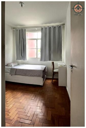 AVENIDA PAULISTA - QUARTO SOLTEIRO em Apartamento compartilhado, São Paulo