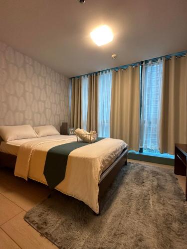 BGC One Uptown Suite by Christine Suites PH, Baras