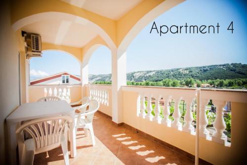 Apartment in Lopar with sea view, loggia, air conditioning, W-LAN (186-4) – khách sạn tại Lopar