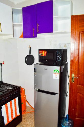 Angie's staycation 1br apt Milimani- Fast internet, secure parking, Free netflix in Kisumu