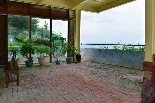 Balcony/terrace, Come and go seaside B&B in Fengpin Township