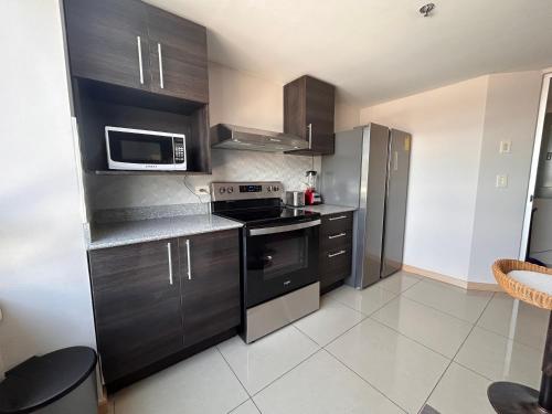 Kitchen, Moderno apartamento totalmente equipado in Hospital