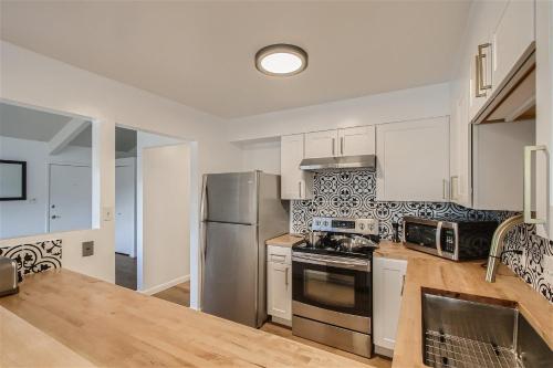 Natural Light, High-Vaulted Ceilings Apartment and Garage detail