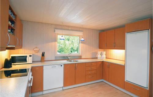 Cuina, Holiday Home Dadyrstien Væggerløse Xii in Idestrup