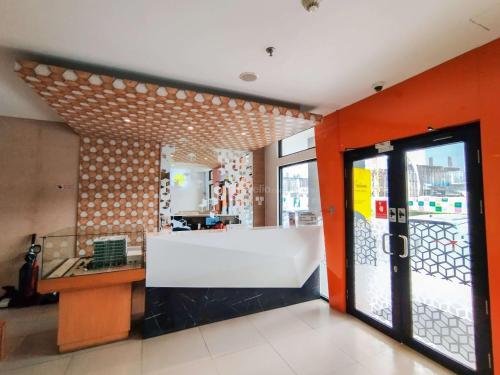 Classic Studio (No Kitchen) with City View at Lodge Paskal Apartment By Travelio