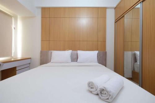 Simply Look Studio at Margonda Residence 5 Apartment By Travelio