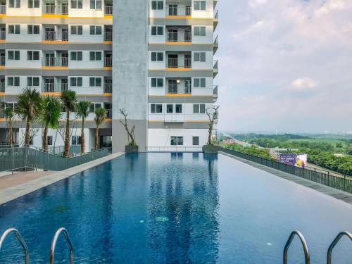 Exterior view, Cozy and Restful Studio LRT City Sentul - Royal Sentul Park Apartment By Travelio in Tajur Halang