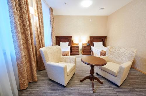 Victoria Hotel na Zamkovoy Minsk Set in a prime location of Minsk, Victoria na Zamkovoy Hotel puts everything the city has to offer just outside your doorstep. Offering a variety of facilities and services, the hotel provides all you
