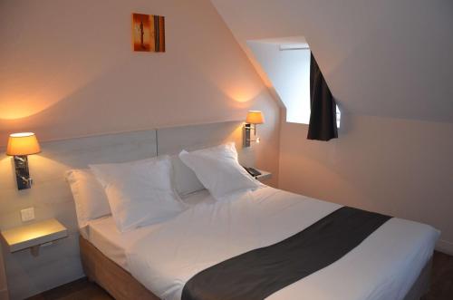 Brit Hotel Du Dauphin L'Aigle - Tap to explore photos
