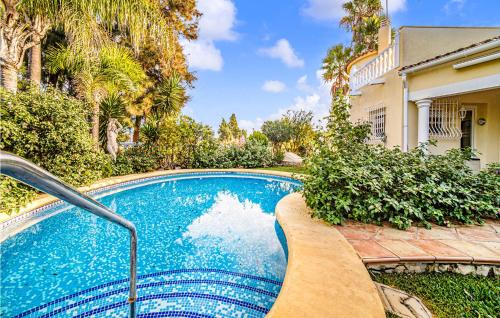Two-Bedroom Holiday Home in Oliva - image 2