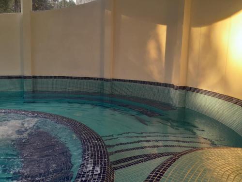 Karstais baseins, ASGARD RESORT GUATEMALA in San Lucas Sacatepéquez