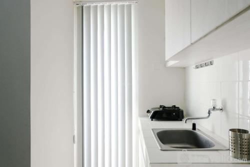 Homey 1BR Apartment with Extra Room at Parahyangan Residence By Travelio