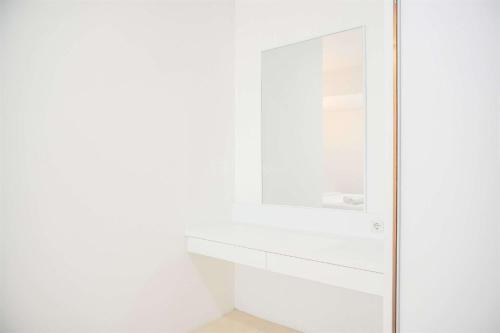 Modern and Homey 2BR at MT Haryono Square Apartment By Travelio