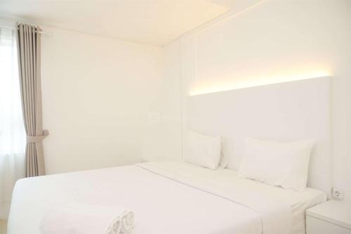 Modern and Homey 2BR at MT Haryono Square Apartment By Travelio