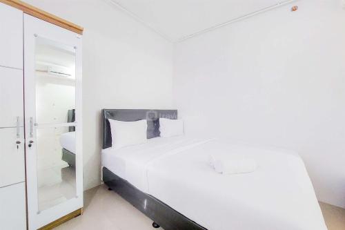 Well Furnished with Cozy Designed Studio Urbantown Serpong Apartment By Travelio