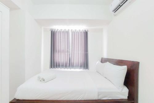 Good Price and Homey 2BR at Loftvilles City Apartment By Travelio, Tangerang Selatan