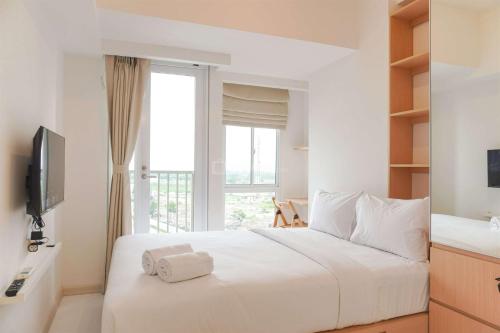 Cozy Living Studio (No Kitchen) Tokyo Riverside PIK 2 Apartment By Travelio, Rawalembang