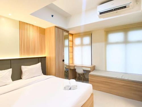 Simply Look Studio at 53th Floor Pollux Chadstone Apartment By Travelio, Cikarang