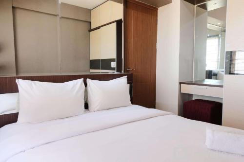 Spacious 3BR Combined Unit at Pinewood Apartment By Travelio Spacious 3BR Combined Unit at Pinewood Apartment By Travelio