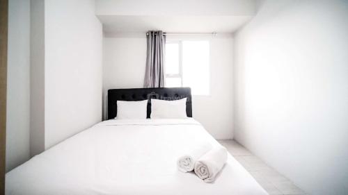 Homey 2BR Apartment at Suncity Residence By Travelio - image 5