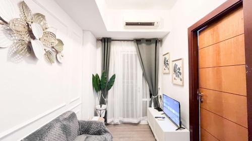 Comfortable and Good Deal 2BR Apartment at Vida View Makassar By Travelio Comfortable and Good Deal 2BR Apartment at Vida View Makassar By Travelio