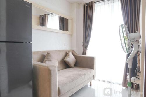 Comfort and Warm 2BR at Parkland Avenue Apartment By Travelio