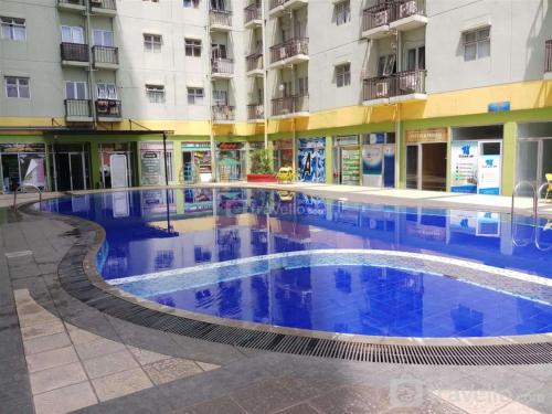 Restful 2BR Apartment at The Suites Metro By Travelio