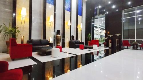 Best Location and Tidy 2BR Apartment at Trillium Residence By Travelio - image 5