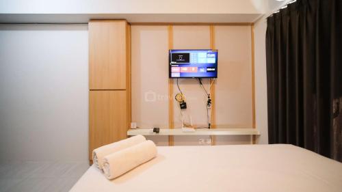 Studio Apartment room in Good Location and Best Deals Studio Apartment at Suncity Residence By Travelio