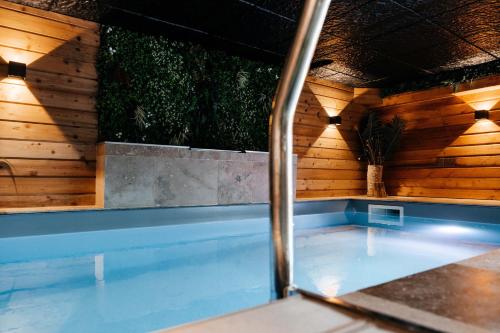 Swimming pool, LA MOTTE FEODALE luxury medieval MANOR rated 5 stars in Normandy in Surville