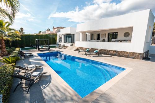 สวน, Casa Eivissa - Stunning modern villa in Javea, perfect for a family break in บาเย เดลซอล