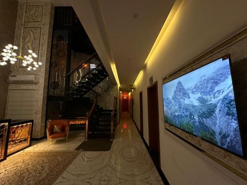 Shared lounge/TV area, Multan Swiss Hotel in Multan