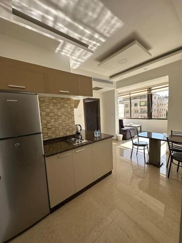 abdoun rooftop 1bedroom kh&sh 03 - image 2