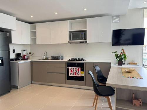 Encanto Rentals at Sunno Beach - Photo 3