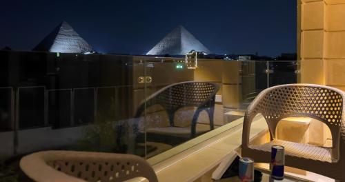 Pyramids Land Palace Room Type - King Suite with Pyramids View & Balcony