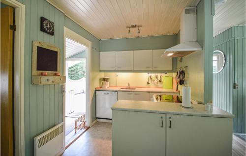 Konyha, Three-Bedroom Holiday Home In Ans By in Ans By