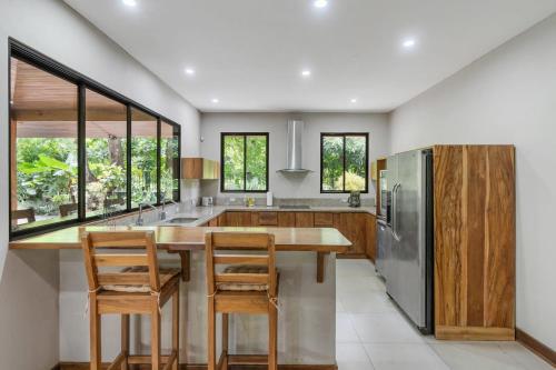 Spacious 3-Bedroom Coastal Home with Shared Pool, Outdoor Living & Steps to Playa Potrero in Potrero