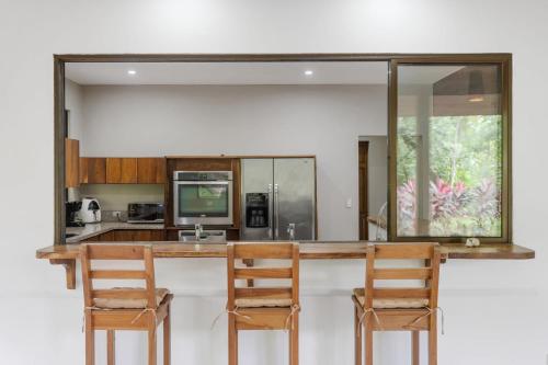 Spacious 3-Bedroom Coastal Home with Shared Pool, Outdoor Living & Steps to Playa Potrero in Potrero