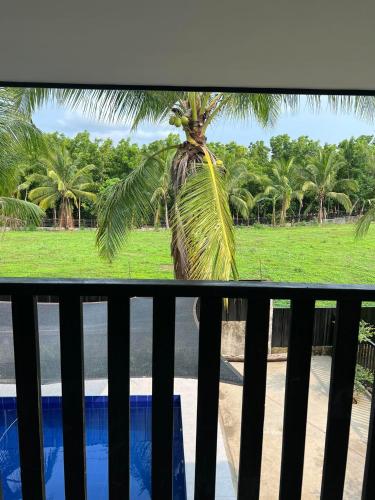 ระเบียง/ชานเรือน, The Hidden Villa - Your home away from home in นาซุกบู